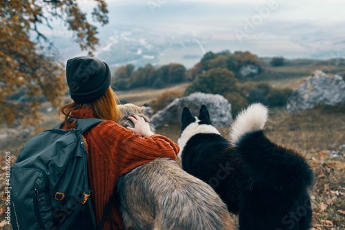 woman hiker in nature with dogs adventure travel © SHOTPRIME STUDIO