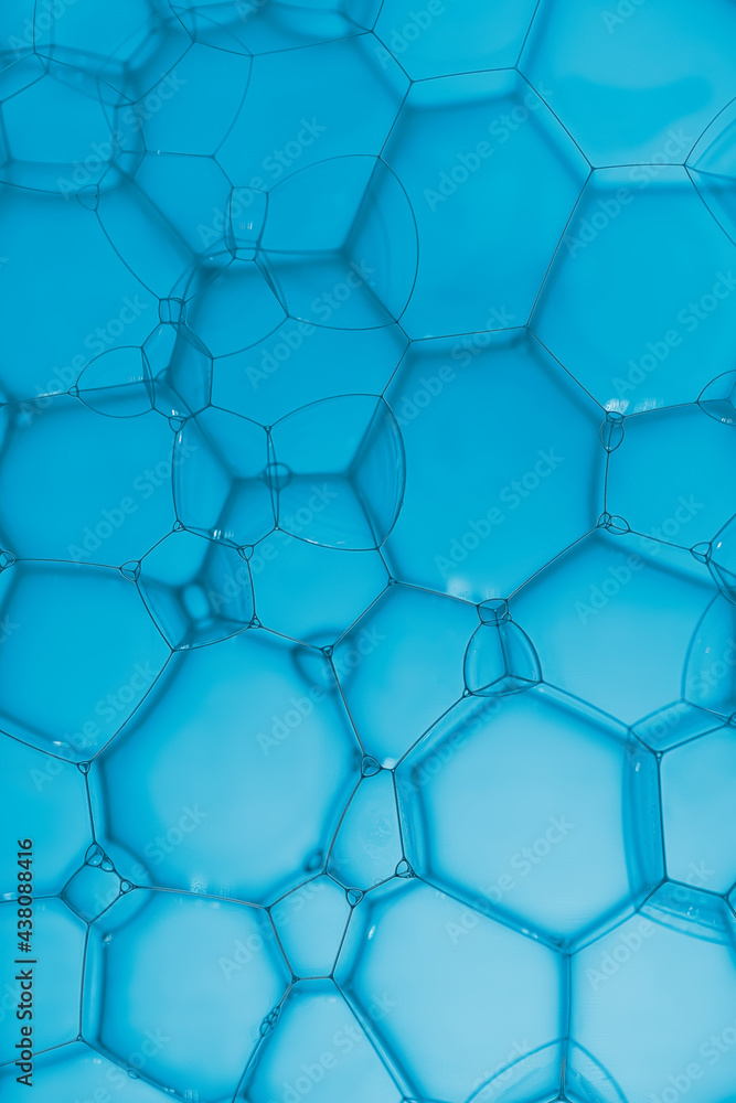 Fototapeta premium Abstract soap bubble and pattern on blue background.