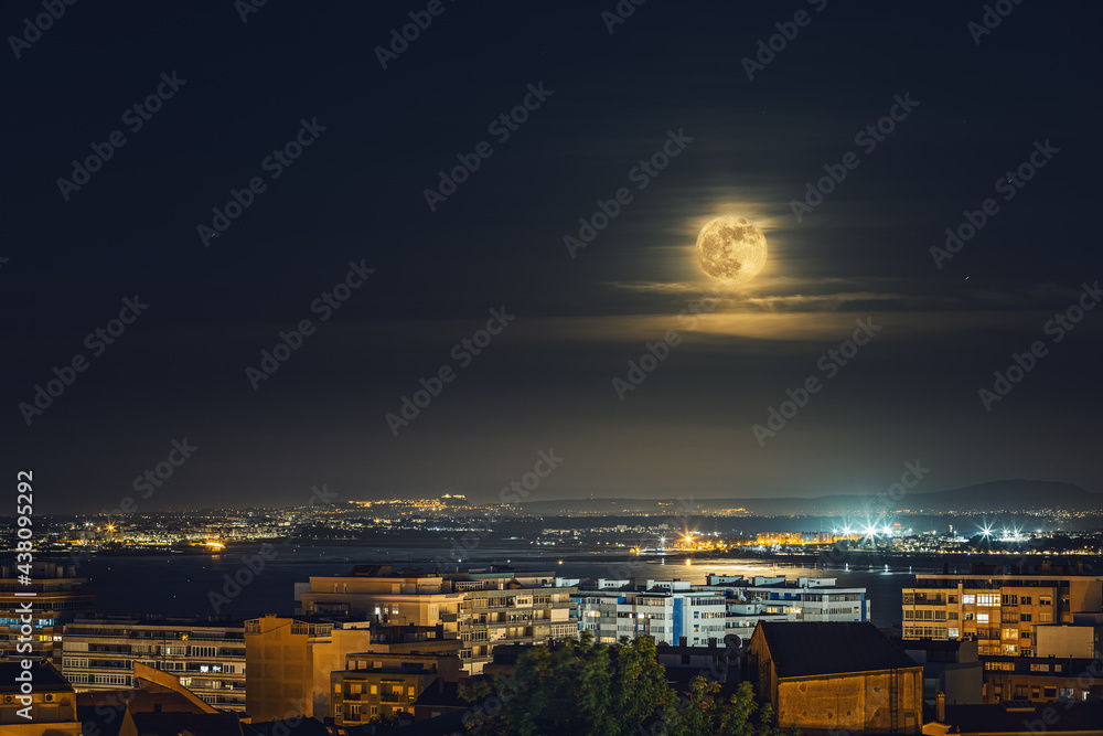night city landscape with big moon. supermoon in special seasons