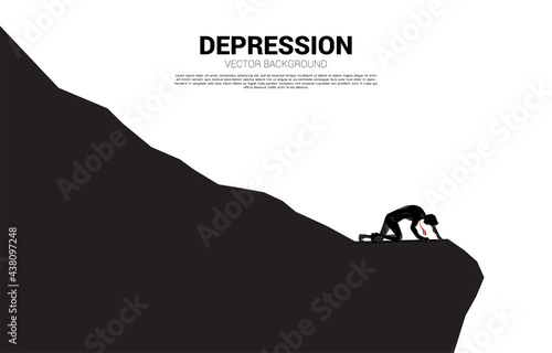 silhouette of businessman crawling on down hill. Concept for depression and down turn business.