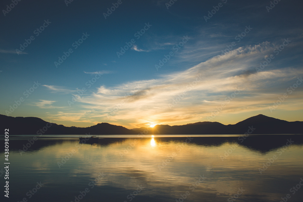 The Morning Sun in Kenepuru Sound, Marlborough Sounds, New Zealand