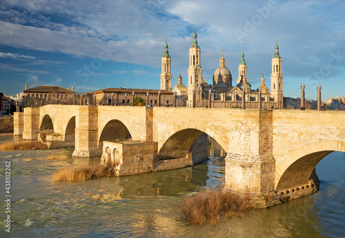 Zaragoza - The panorama of bridge Puente de Piedra and Basilica del Pilar over the Ebro river.