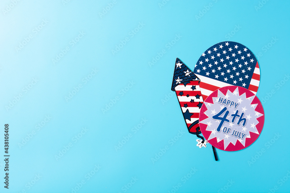 Happy 4th July ornament on blue background. Copy space