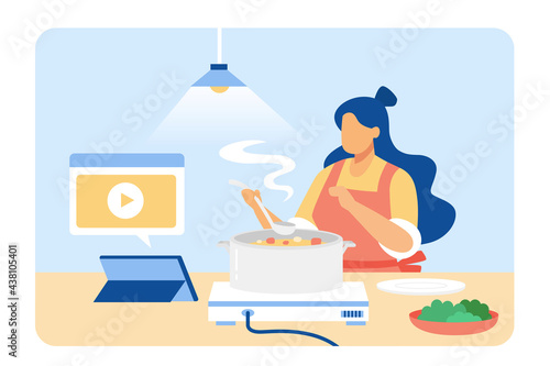 Woman taking online cooking class