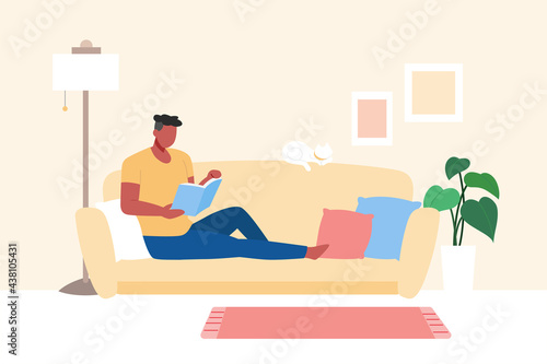 Man reading on sofa at home