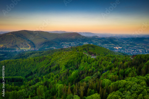 Fototapeta Naklejka Na Ścianę i Meble -  Panorama of the Silesian Beskids from Rownica peak at sunrise. Poland