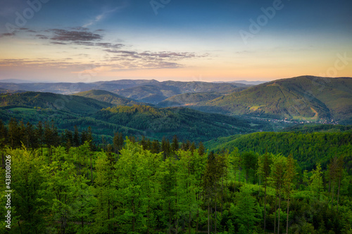 Fototapeta Naklejka Na Ścianę i Meble -  Panorama of the Silesian Beskids from Rownica peak at sunrise. Poland