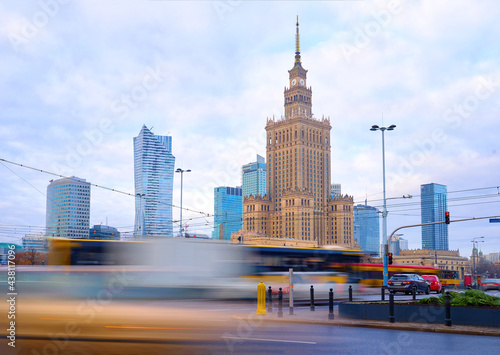 High traffic near the Palace of Culture and Science in Warsaw, Poland. Long exposure shot of city life. Business center cityscape.