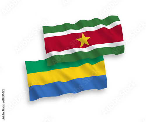 Flags of Republic of Suriname and Gabon on a white background