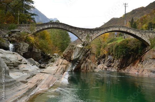 Ponte dei Salti  at Swiss Alps Valley with river between colorful trees and leaves  Ticino Valle Maggia  Maggiatal