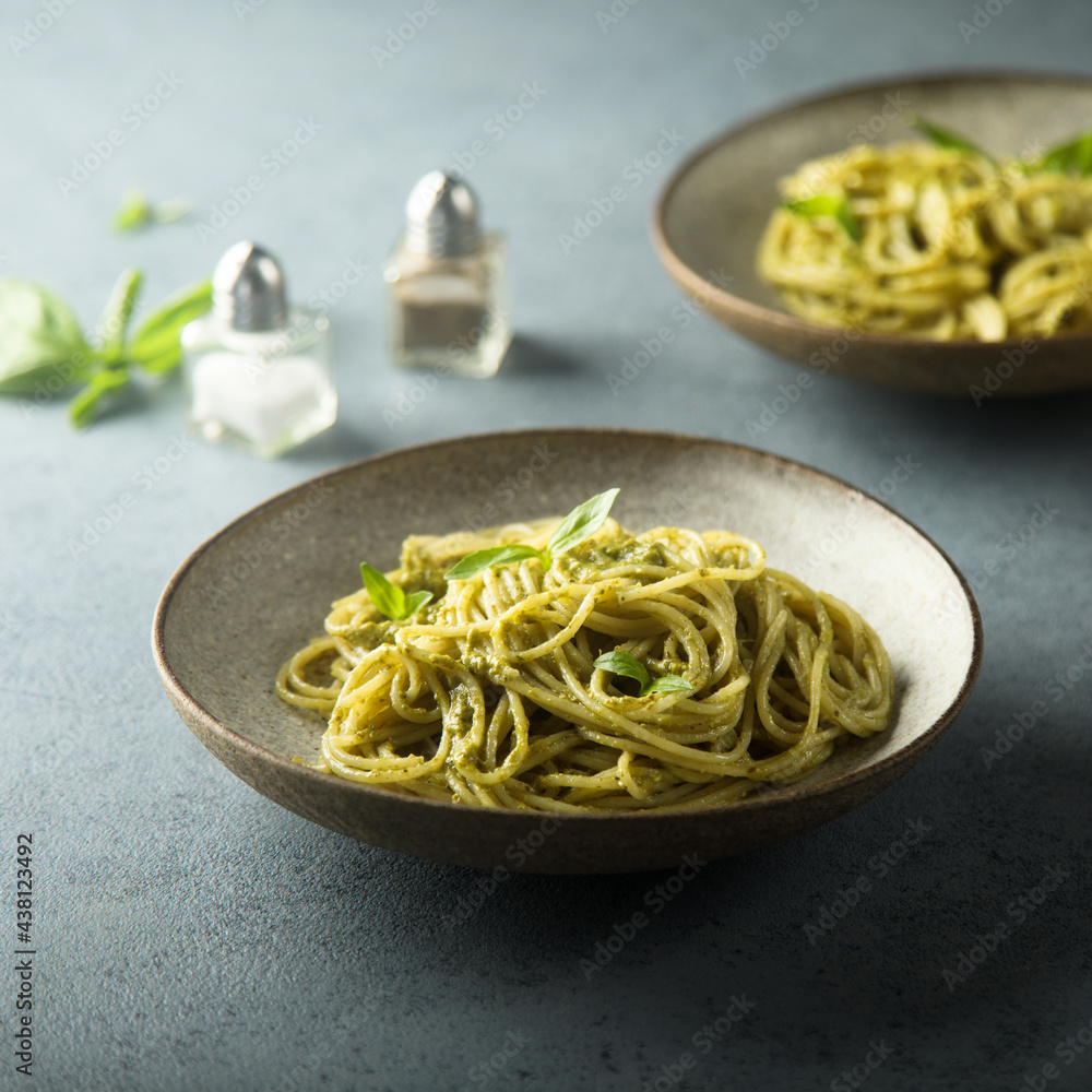 Traditional homemade pasta with pesto sauce Traditional homemade pasta with pesto sauce