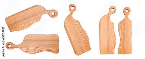 Set of wooden chopping cutting boards isolated on a white background. Charcuterie style serving boards. Manual work. Fancy and unusual shapes. Various angles.