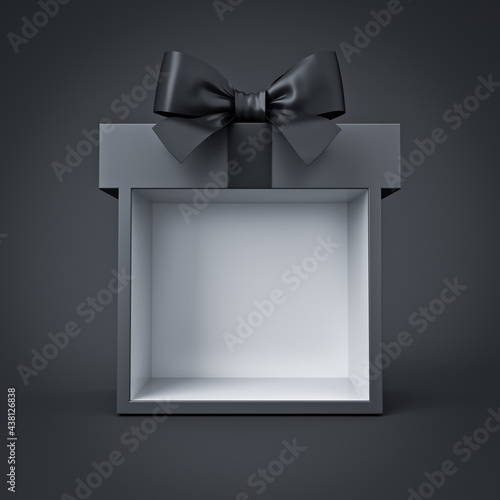 Blank black gift box product display with black ribbon bow isolated on dark background minimal black friday super sale conceptual 3D rendering photo