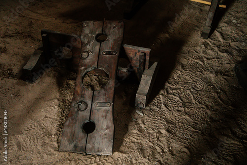 Vintage medieval Torture Equipment in museum, Rack, break-knee, Torture chamber in medieval gothic castle Bezdez, ancient fortress, fairytale stronghold, North Bohemia, Czech Republic photo