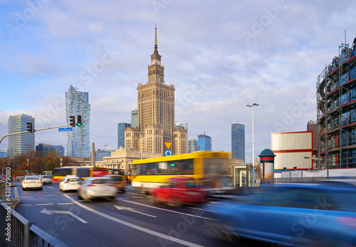 High traffic near the Palace of Culture and Science in Warsaw, Poland. Long exposure shot of city life. Business center cityscape.