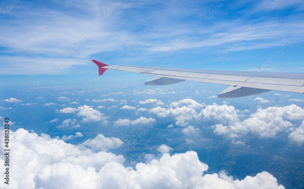 Aircraft wings fly on clouds sky Aircraft wings fly on clouds sky