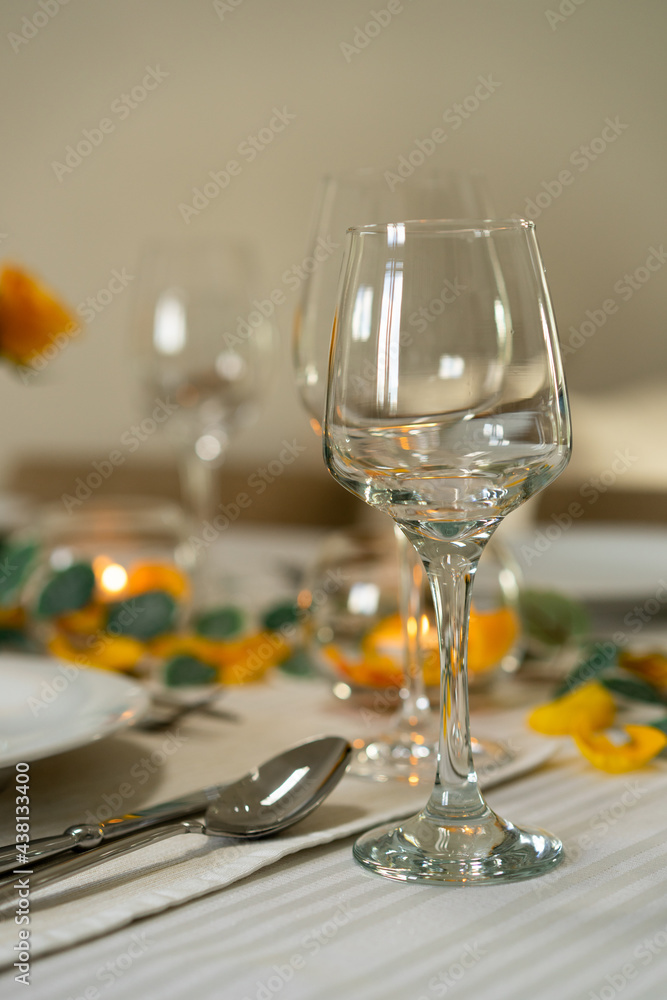 Table design for dinner. A romantic table decorated with roses. Table design for dinner. A romantic table decorated with roses.
