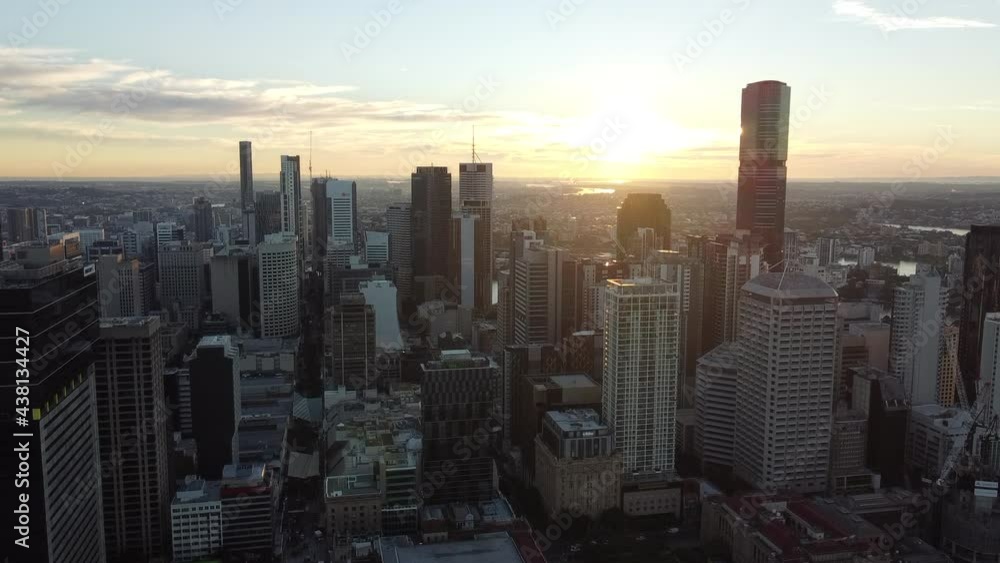 Brisbane city skyline in high angle drone view during colorful sunrise Brisbane city skyline in high angle drone view during colorful sunrise