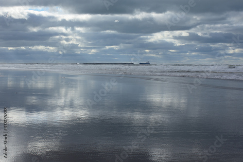 Reflection of a cloudy day in the sea water