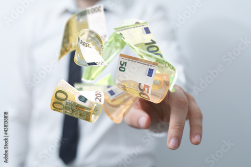 euro bills flying around  i...
