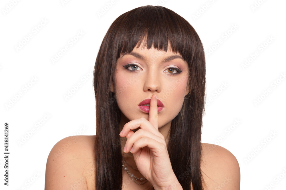 portrait of beautiful woman gesturing silence portrait of beautiful woman gesturing silence