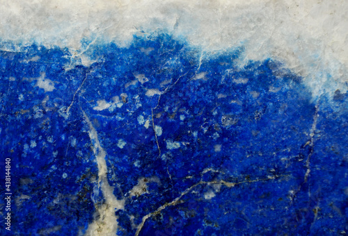 lapis lazuli natural background closeup, blue texture for design