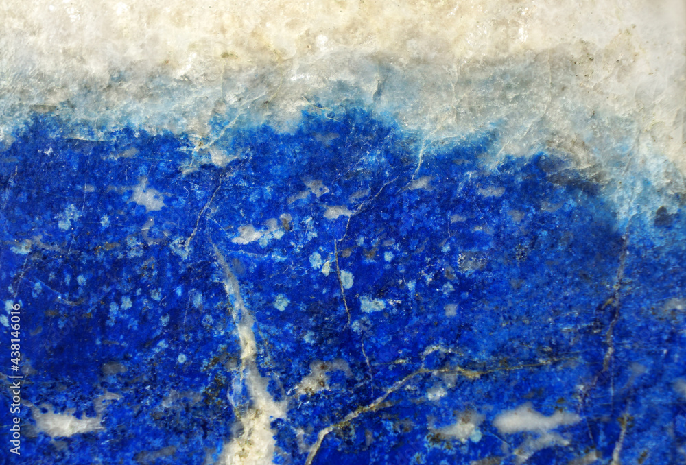 lapis lazuli natural background closeup, blue texture for design