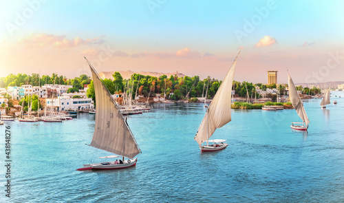 Aswan, Nile River scenery with famous sailboats, Egypta