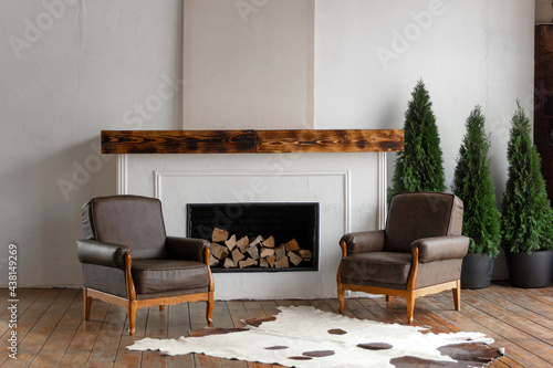 Fotomural Spacious light white country house interior in eco style with teo chairs and fir