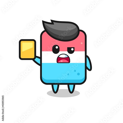 cartoon eraser character as a football referee giving a yellow card