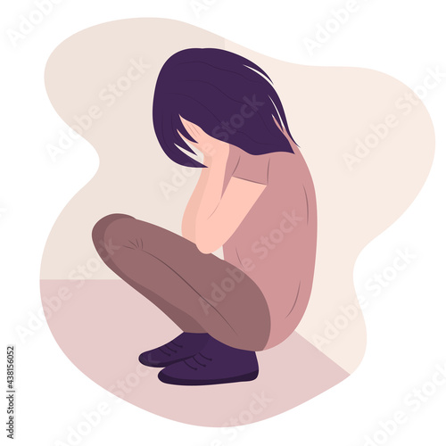 A young female crying and covering her face. Lonely girl needs support, and care because of depression, anxiety. Mental health concept. Victim of domestic and sexual violence.