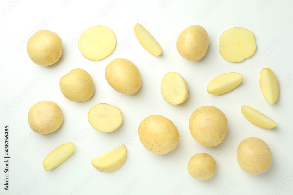Tasty young potato on white background, top view Tasty young potato on white background, top view
