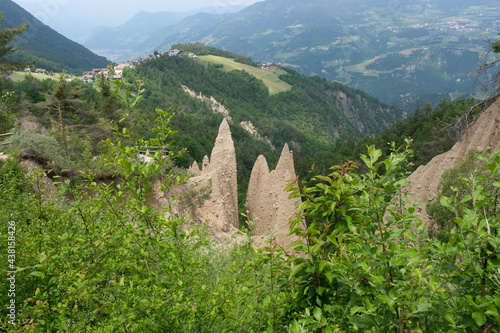 The incredible earth pyramids of Collepietra (Piramidi di Terra) in the Dolomites. Striking place. Italian Alps. Sunny spring day. Trentino Alto Adige. photo