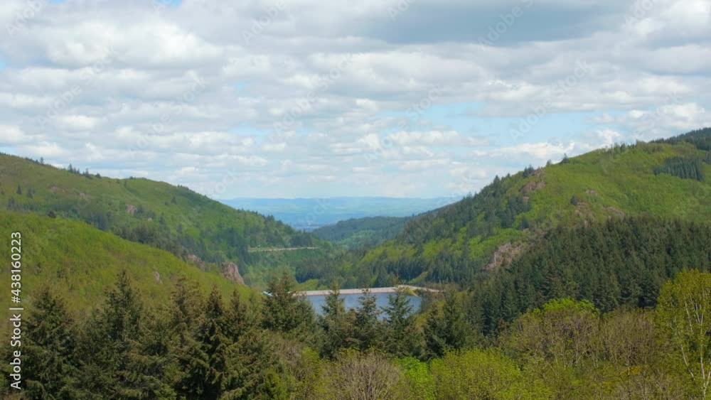 Panoramic views across the Loire Valley showing lush alpine mountainsides and clear blue lakes Panoramic views across the Loire Valley showing lush alpine mountainsides and clear blue lakes
