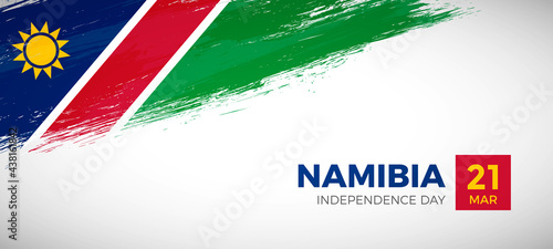 Happy independence day of Namibia with brush painted grunge flag background
