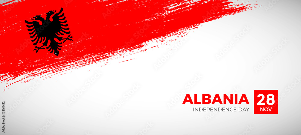 Happy independence day of Albania with brush painted grunge flag background Happy independence day of Albania with brush painted grunge flag background