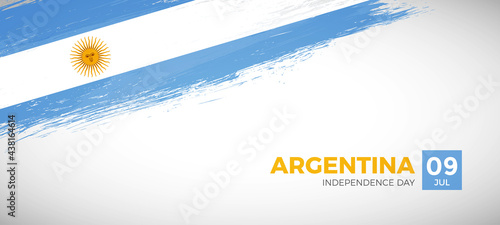 Happy independence day of Argentina with brush painted grunge flag background