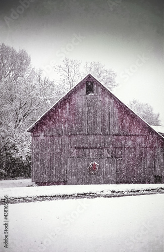 Old red barn and snow scene.