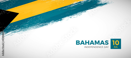 Happy independence day of Bahamas with brush painted grunge flag background