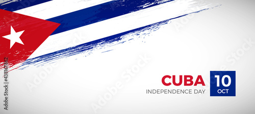 Happy independence day of Cuba with brush painted grunge flag background