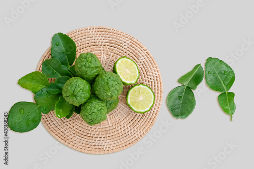 Fresh bergamot from nature Resting on a wooden chopping board To be used as a cook and nourishing human hair and skin. photo