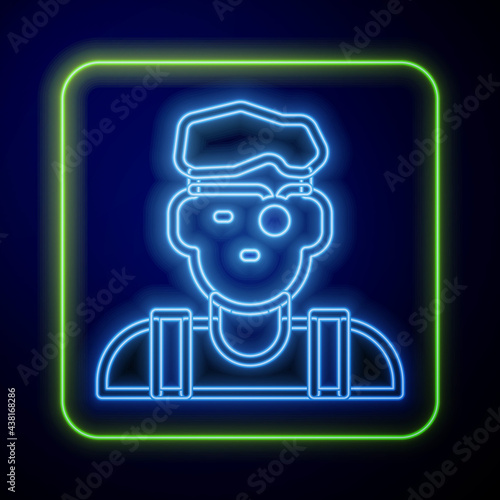 Glowing neon Jeweler man icon isolated on blue background. Vector