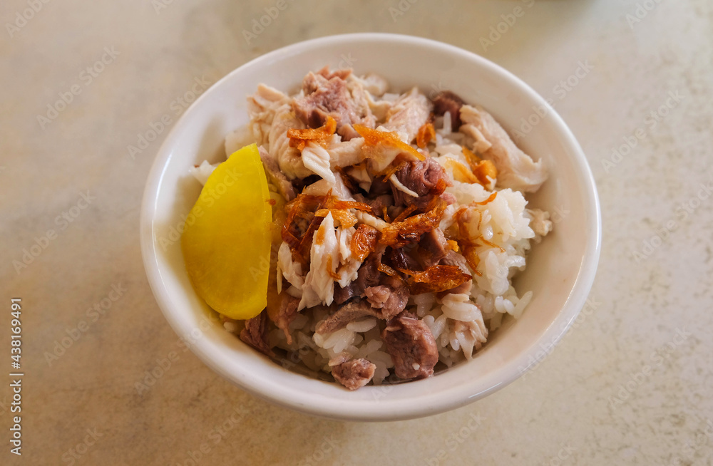 Taiwanese chicken rice with pickled radish. Taiwanese chicken rice with pickled radish.