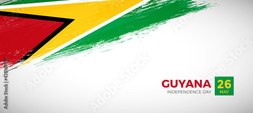 Happy independence day of Guyana with brush painted grunge flag background