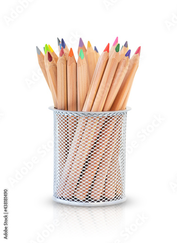 Back to school and education and business concept. A set of wooden colorful pencils in a holder isolated on a white background. 