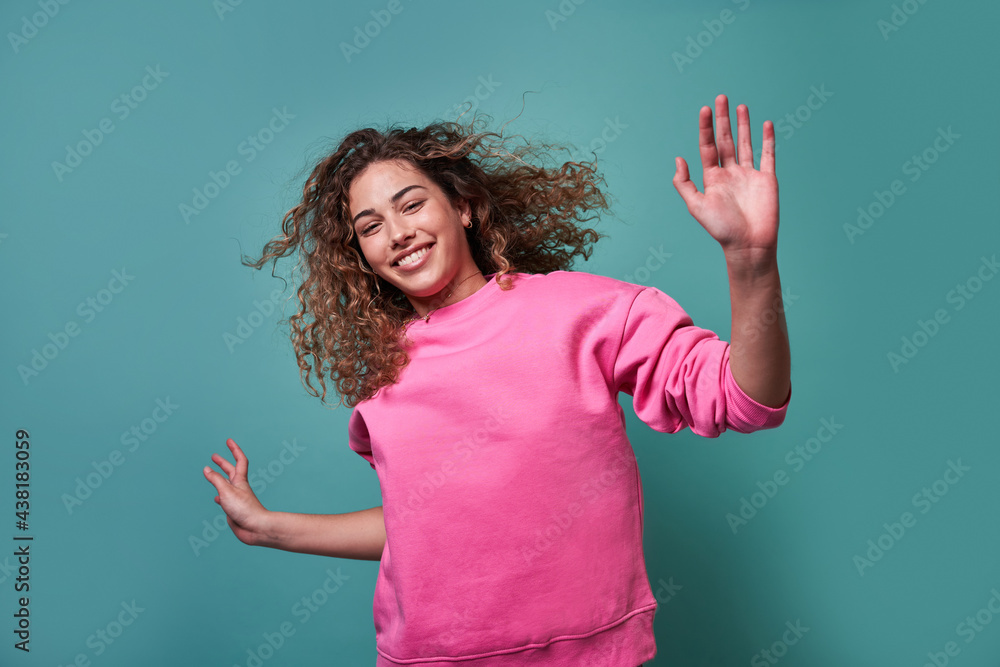 Happy woman standing in studio Happy woman standing in studio