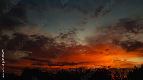 Bright red orange sunset in the clouds