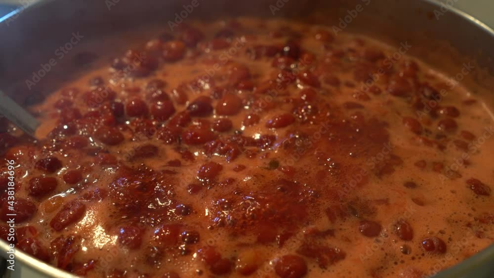 Cooking European Cornel fruits in a pot (Cornus mas) - (4K) Cooking European Cornel fruits in a pot (Cornus mas) - (4K)