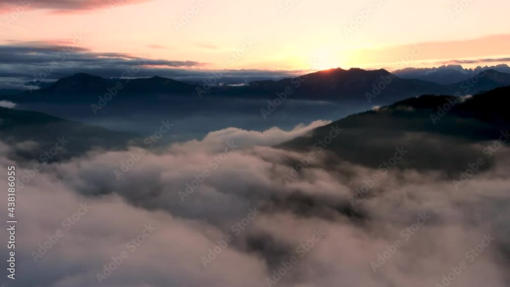 Drone Aerial Sunset over Clouds in Alps Mountains Northern Italy Drone Aerial Sunset over Clouds in Alps Mountains Northern Italy