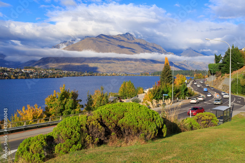 The road into the resort town of Queenstown, New Zealand, passing by scenic Lake Wakatipu